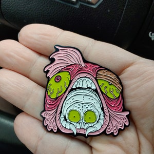 Madballs-inspired Parasitology enamel pin: Cymouth the Tongue Biter Cymothoa exigua isopod image 1