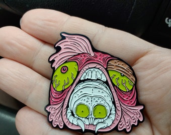 Madballs-inspired Parasitology enamel pin: Cymouth the Tongue Biter ( Cymothoa exigua isopod)
