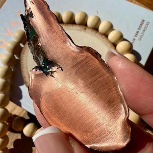 May include: A set of three ceramic mugs with a speckled, matte finish. The mugs are in shades of cream, light gray, and dark gray. Each mug has a simple, minimalist design, perfect for coffee or tea.