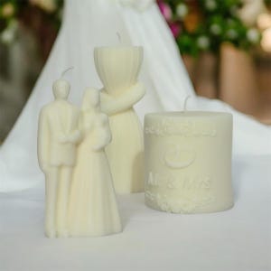 May include: A white ceramic mug with a black handle and the text "But First, Coffee" in a black, bold font. The mug is on a white surface. The mug is approximately 4 inches tall.