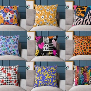 The image is a collage of nine different throw pillows, each with unique and vibrant patterns and colors.