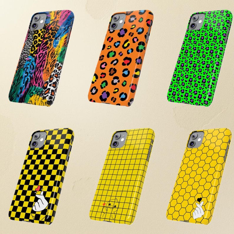 a collection of six colorful and patterned phone cases, each with a unique design.