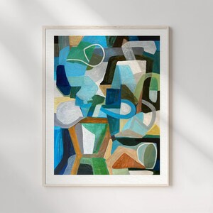 May include: A framed abstract painting featuring a composition of overlapping geometric shapes and curved lines in shades of navy blue, sky blue, forest green, tan, ochre, and white, presented within a light-colored wooden frame.