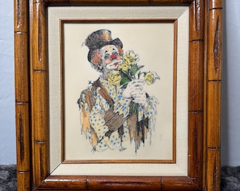 JR BLAIRによるヴィンテージ版画。バラを持ったピエロが描かれ、竹製の額縁に収められている。サイズ：14.5インチ×16.5インチ。