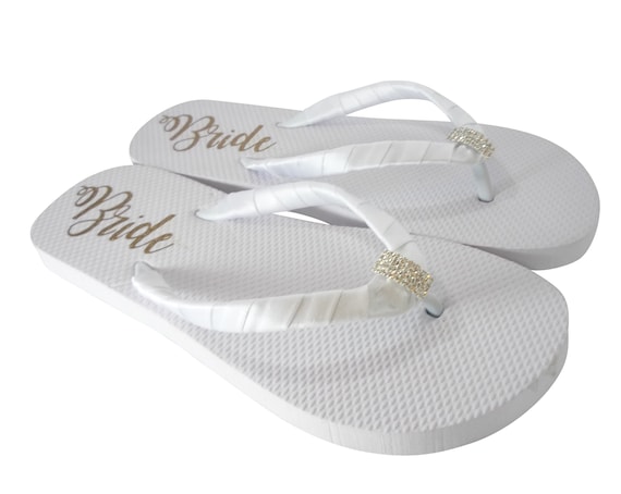 gold embellished flip flops