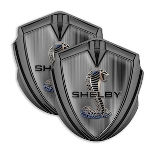 Shelby 3D Domed Gel Metal Emblem – Glossy Waterproof Car Badge for Hood, Grill, Fender Door– Self Stick Auto Decal Sticker Many Desighns