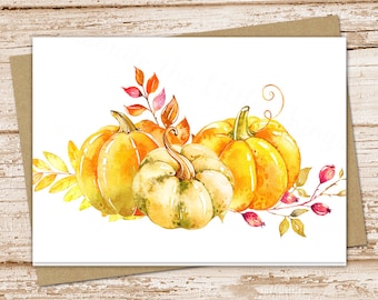 May include: Watercolor painting of three pumpkins with fall leaves and berries. The pumpkins are orange, yellow, and green. The leaves are red, orange, and yellow. The berries are red.