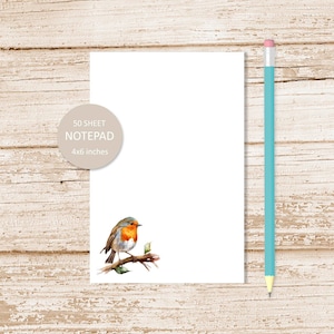 May include: A 50-sheet notepad with a robin illustration. The notepad is 4x6 inches.