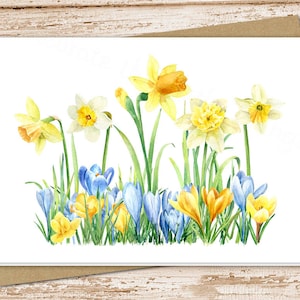 May include: A watercolor painting of a bouquet of yellow daffodils and blue crocuses. The flowers are arranged in a cluster, with the daffodils in the center and the crocuses surrounding them. The background is a white, textured paper.