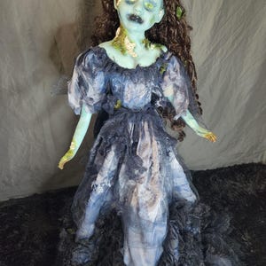 Creepy horror doll Wyn of the water