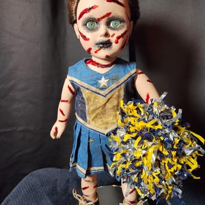 Creepy horror doll Slashed Cheerleader Courtney