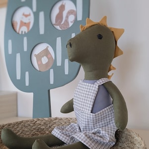 Handmade Linen Dino Doll: Embroidered Nursery Decor