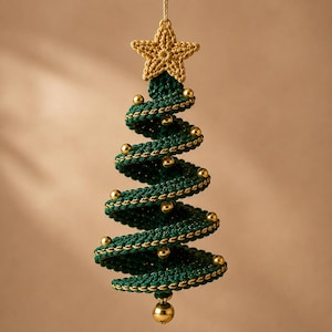May include: A spiral-shaped Christmas tree ornament crafted from dark green yarn with gold metallic trim. The tree is topped with a crocheted gold star and decorated with small, shiny gold spherical beads along the spiraling branches.