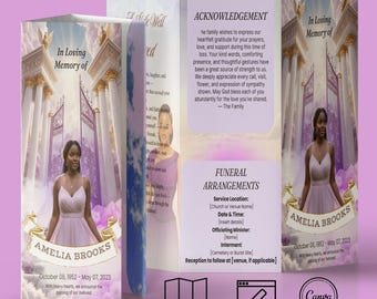May include: A trifold brochure in shades of purple and white, with the text "In Loving Memory of Amelia Brooks." The brochure features a photograph of a woman in a dress, and details about funeral arrangements.