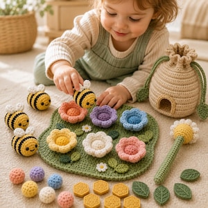 May include: A crochet playset featuring a green mat with attached flowers, three small striped bees, a beige beehive-shaped drawstring bag, a long-stemmed daisy, several small colorful yarn balls, six yellow hexagonal honeycomb pieces, and green leaves.