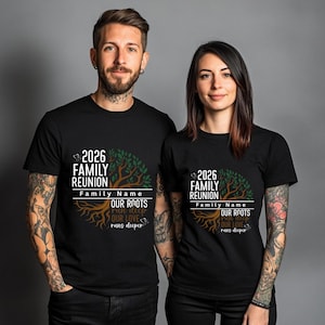 May include: Two people wearing matching black t-shirts. Each shirt features a tree graphic with the text "2026 Family Reunion" and "Our Roots run deep, Our Love runs deeper". The shirts are a family reunion theme.