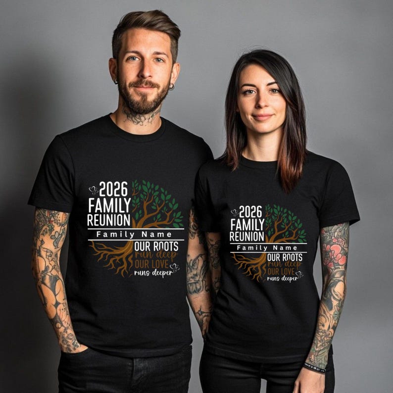 May include: Two people wearing matching black t-shirts. Each shirt features a tree graphic with the text "2026 Family Reunion" and "Our Roots run deep, Our Love runs deeper". The shirts are a family reunion theme.