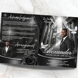 May include: A memorial service program with a black and white design. The program includes the name "Alexander" and dates, along with text about arrangements and acknowledgements. A photo of a man in a suit is featured.