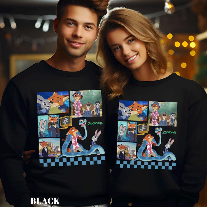 May include: A black crewneck sweatshirt featuring a graphic print of various scenes from the movie Zootopia, including characters Nick Wilde and Judy Hopps, a blue snake, and the Zootopia logo, finished with a black and blue checkered border.