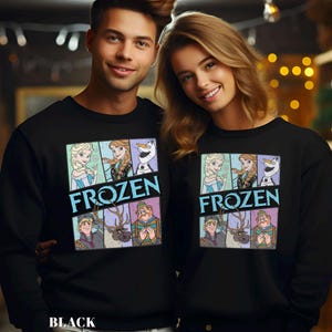 May include: Black sweatshirts featuring a colorful graphic of characters from the movie "Frozen." The word "FROZEN" is printed in blue and white. The sweatshirts are long-sleeved.