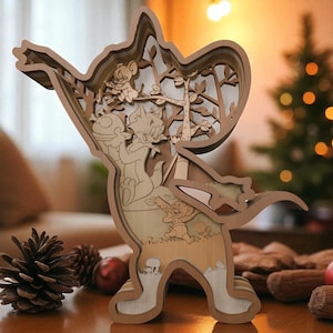 May include: A multi-layered wooden sculpture depicting a cartoon character in a lively pose. The sculpture has detailed cutouts of characters and a forest scene. The colour scheme is mainly natural wood tones with white accents.