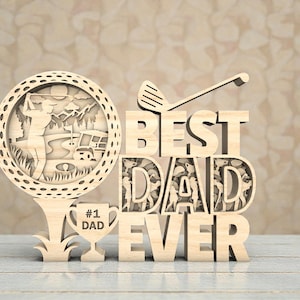May include: Wooden golf-themed decorative piece with the words "BEST DAD EVER." The design includes a golf ball with a golfer silhouette, a golf club, and a trophy that says "#1 DAD."