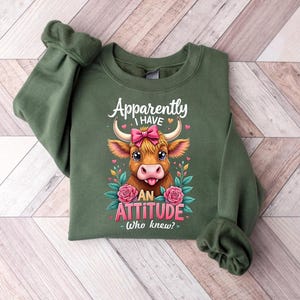 Apparently I Have an Attitude Shirt – Funny Highland Cow Graphic Shirt with Flowers & Bow – Sassy Country Girl Shirt – Cow Gift for Her