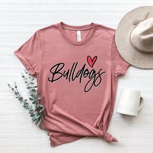 Bulldogs Shirt with Heart – Cute Mascot Script Shirt, School Spirit Tee, Minimalist Bulldogs Fan Shirt for Teachers, Moms & Students