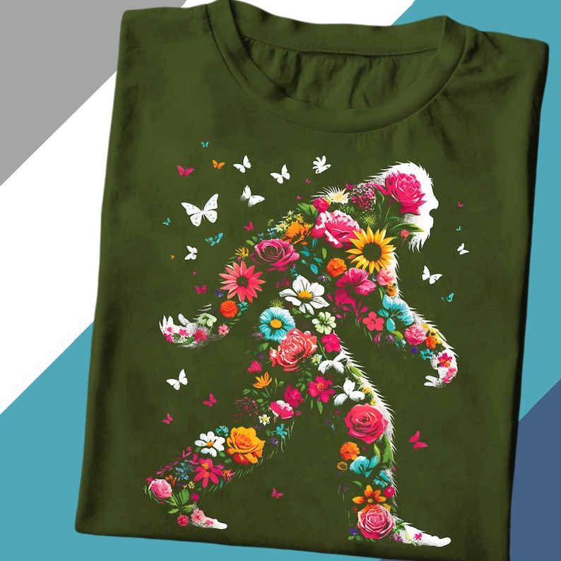 a green t - shirt with flowers and butterflies on it