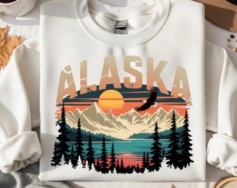 Vintage Alaska-sweater: bergzonsondergang, adelaar en bos