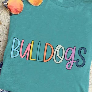 Bulldogs Mascot PNG, School Spirit Bulldogs Shirt PNG, Team Pride Sublimation, Cheer Squad Pep Rally Png, Colorful Bulldog Fan Png Design