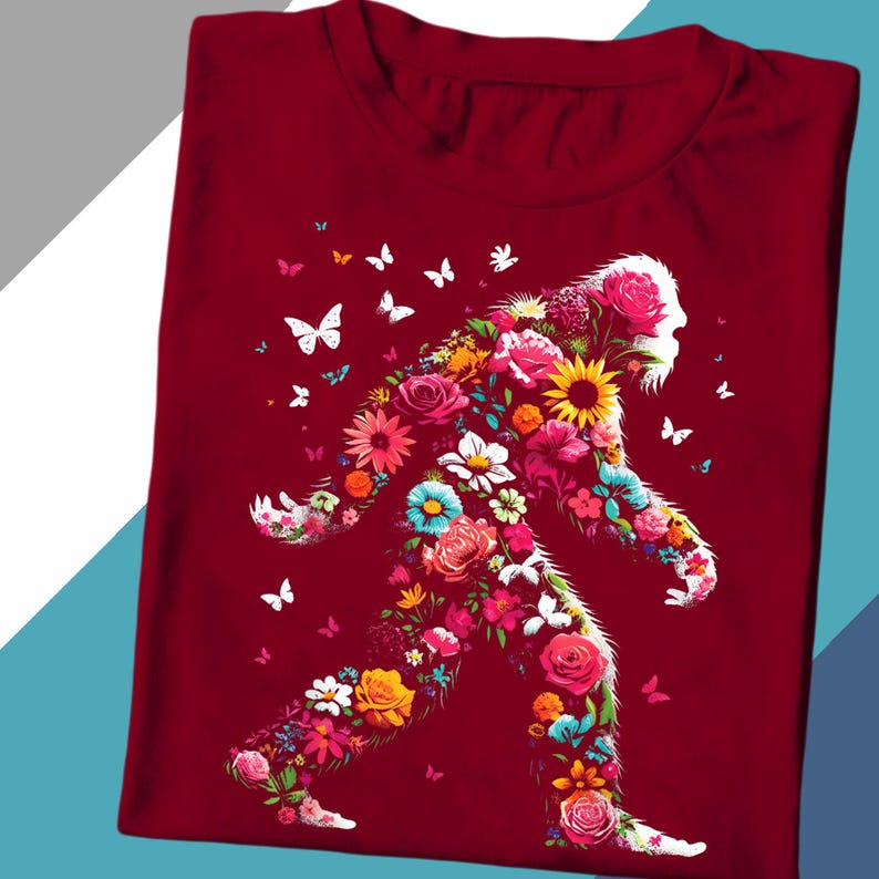a red t - shirt with a floral design on it