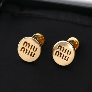 Miu miu earrings - Etsy 日本