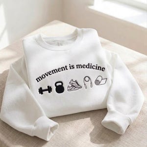 Embroidered Movement is Medicine Sweatshirt, Fitness Sweatshirt, Physical Therapy Sweatshirt, Exercise Lover Gifts White