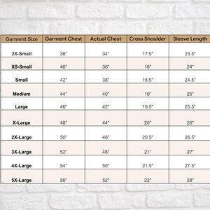 May include: A chart showing garment size, garment chest, actual chest, cross shoulder, and sleeve length measurements in inches.