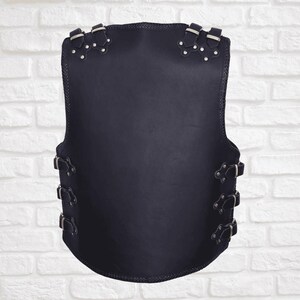 Back view of men’s black leather biker vest with clean panel for patches