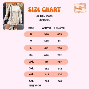 May include: Size chart for Gildan 18000 unisex apparel. The chart displays sizes S to 5XL, with width and length measurements in centimeters. The chart is on a light pink background with the text "Size Chart" in orange.