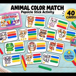 Könnte beinhalten: Animal Color Match Popsicle Stick Activity Set mit 40 Karten, die Tiere wie einen Frosch, eine Eule und einen Koala zeigen. Jede Karte enthält farbige Balken zum Zuordnen. Enthält ein rosa Aufbewahrungsetui und ein 4x6 Zoll Etikett.