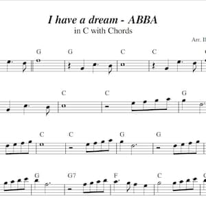 Peut inclure: Partition musicale de la chanson "I Have a Dream" d'ABBA en do majeur, avec accords. Le titre est en haut, suivi de la notation musicale sur fond blanc. Arrangement de Ilaria Roberti.