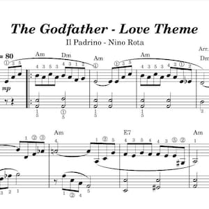 Puede incluir: Partitura de "The Godfather - Love Theme" de Nino Rota, arreglada por Ilaria Roberti. La partitura en blanco y negro presenta claves de sol y de fa, con notas y símbolos musicales. El tempo está marcado a 80 pulsaciones por minuto.
