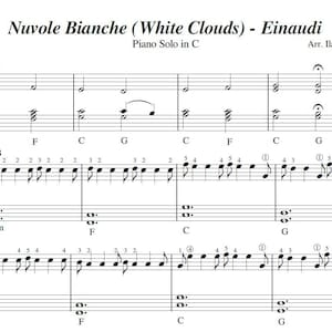 May include: Sheet music for the piano piece "Nuvole Bianche (White Clouds)" by Ludovico Einaudi, arranged for piano solo in C by Ilaria Roberti. The music includes notes, clefs, time signatures, and dynamic markings.