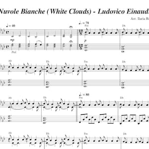 Könnte beinhalten: Notenblatt für "Nuvole Bianche (White Clouds)" von Ludovico Einaudi. Die Musik ist auf weißem Hintergrund mit schwarzen Noten und musikalischen Symbolen geschrieben. Titel und Name des Komponisten stehen oben, mit Tempo- und Dynamikangaben.