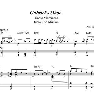 Może przedstawiać: Nuty do utworu "Gabriel's Oboe" Ennio Morricone z filmu "The Mission". Partytura zapisana na białym tle z czarnymi nutami i tekstem. Tytuł i nazwisko kompozytora u góry, z zapisem nutowym i akordami.