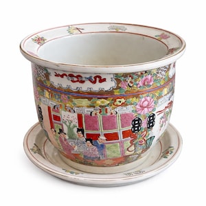 May include: A handmade, wooden serving tray with a natural finish. The tray features a rectangular shape with raised edges and integrated handles. The wood grain is visible, showcasing the tray's craftsmanship. Dimensions are approximately 16 inches long, 10 inches wide, and 2 inches high.