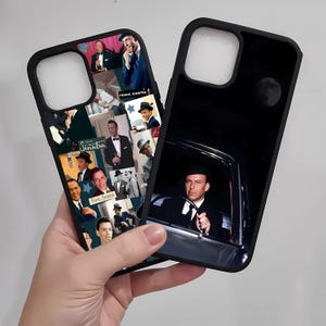 May include: Two black phone cases. One case features a collage of photos of Frank Sinatra, while the other case has a black and white photo of a man driving a car with a moon in the background.