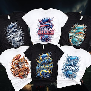 May include: A collection of six t-shirts featuring football team graphics. Designs include team names like "Cowboys," "Bills," "Dolphins," "Bengals," "Rams," and "Lions," each with a football and helmet illustration. The shirts are black and white.