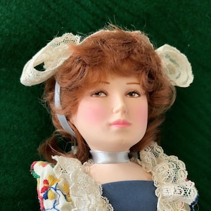 Vintage Effanbee Effanbee&#39;s 1984 Edna Hibel Flower Girl of Brittany Porcelain Bisque Face Hand Tag Wooden Shoes  Collectible Doll Side Eyes