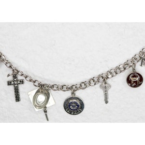 Sterling Silver Charms Bracelet 7 Sterling Charms Graduation College Charms Capricorn, Cross, LaSalle, MSM, 1937 Three Pence,