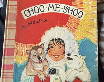 Antiguo juguete infantil Boom Choo-Me-Shoo de Holling, 1928. Hermosos dibujos de niños esquimales de Alaska.
