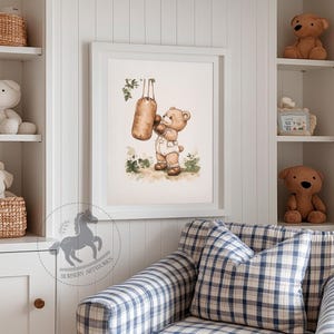 May include: A watercolor illustration of a brown bear wearing boxing gloves and punching a hanging punching bag. The bear is wearing a white shirt and brown shorts. The illustration is set against a green background with leaves and flowers.